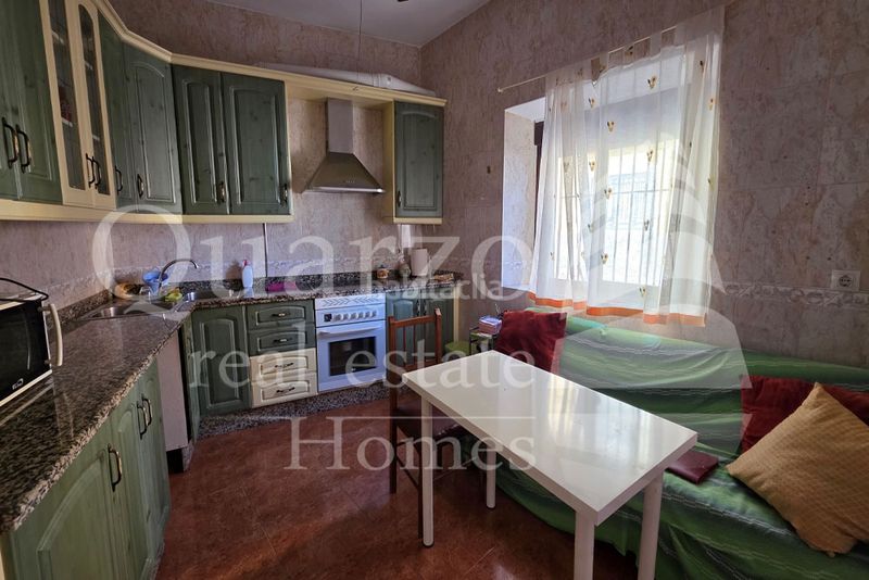 Foto e1cdb7f7-078a-45b9-a362-6f178aa5a400. Casa adossada amb xemeneia calefacció a Madrigalejo