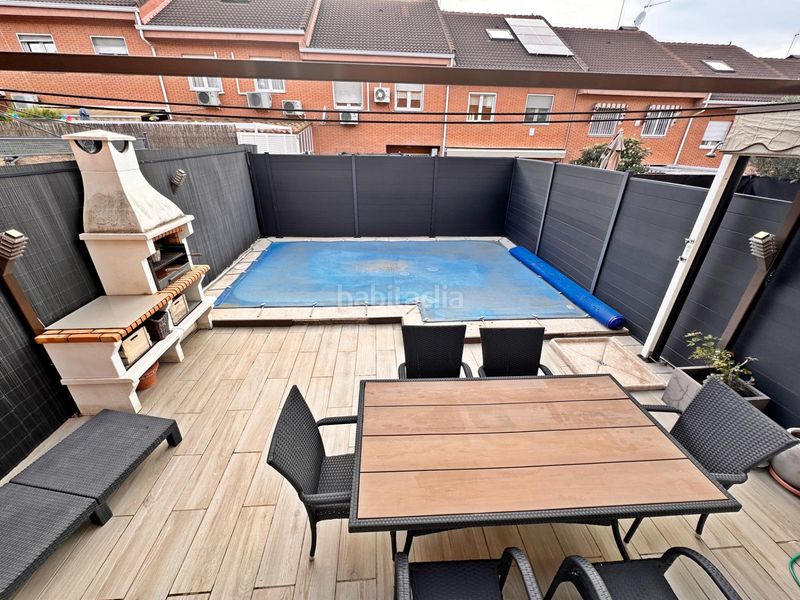 Foto 74f3da81-6c9c-4209-b897-065a9cd3282f. Casa adossada amb calefacció aparcament piscina a Valdemoro