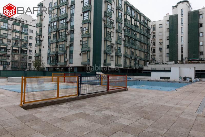 Foto b7e23a1d-a1a8-4d0f-bad7-9f65ec78787f. Etagenwohnung mit heizung parking pool in San Fermín Madrid