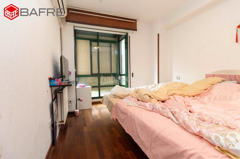 Foto 19d849c1-e392-4ef5-b663-98206d7a7954. Flat with heating parking pool in San Fermín Madrid