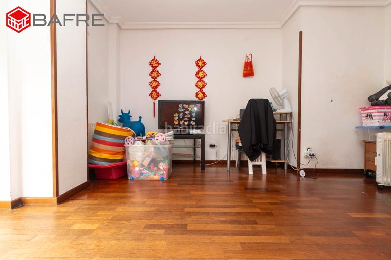 Foto f6619714-c094-4902-8838-8a8db65dc144. Flat with heating parking pool in San Fermín Madrid