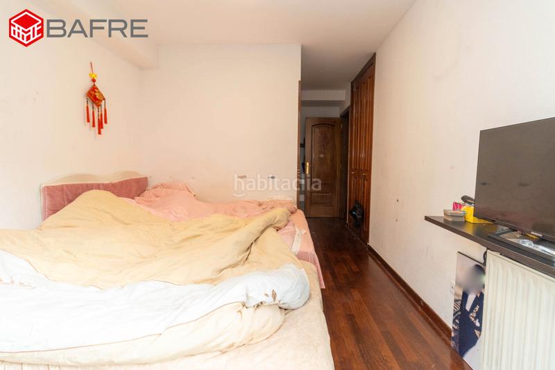 Foto d8c53e75-9b83-4eef-9cdf-1fdcef59444e. Pis amb calefacció aparcament piscina a San Fermín Madrid