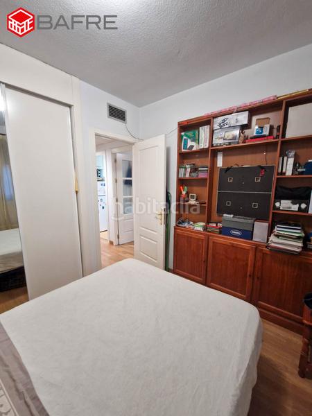 Foto 1d15f264-5ab8-4be6-8e89-b51f5e78bd91. Flat with parking pool in Rejas Madrid