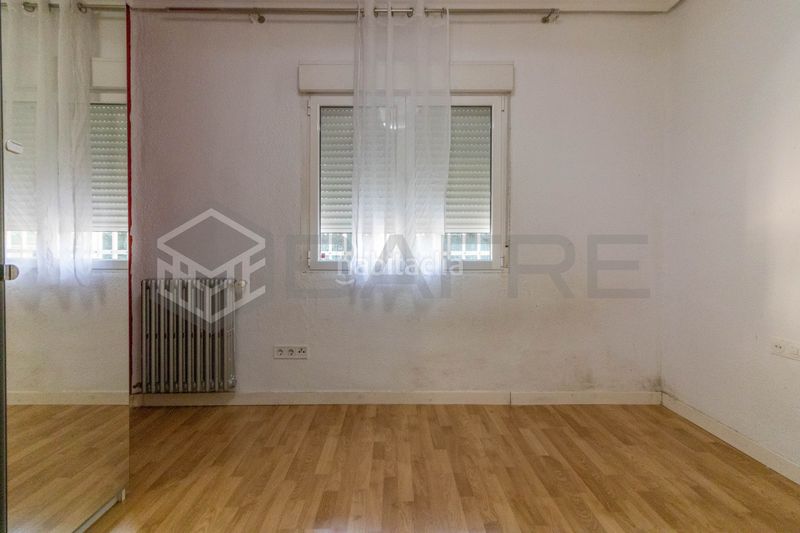 Foto 8a17dba8-2305-49aa-8802-85d38dbdc253. Casa amb calefacció a San Fermín Madrid