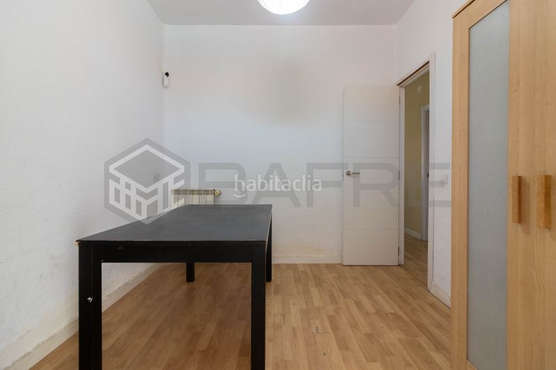 Foto b48929d7-3092-493d-8cb8-739ef21a1111. Casa amb calefacció a San Fermín Madrid