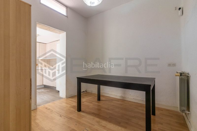 Foto f9664c03-fb02-488e-8e15-df776cf660d0. Casa amb calefacció a San Fermín Madrid