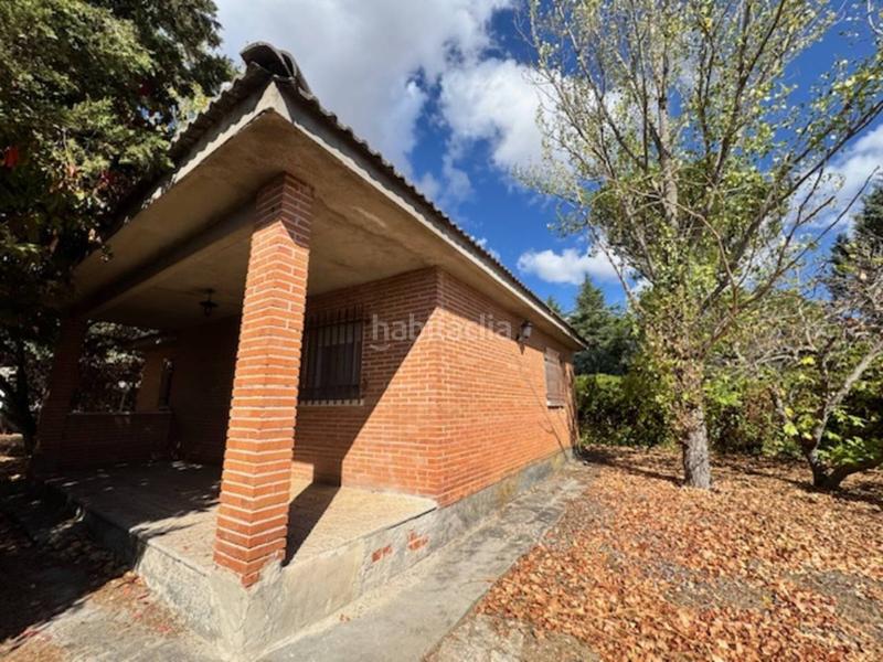 Foto 2d8969ae-e648-4c49-8305-0d5c04d00e67. Casa  unifamiliar con garaje y jardín en Villavieja del Lozoya