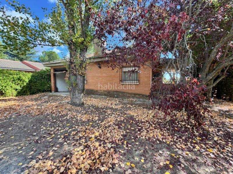 Foto a29c3588-9ba7-4e00-bee7-583663d957bb. Casa  unifamiliar con garaje y jardín en Villavieja del Lozoya