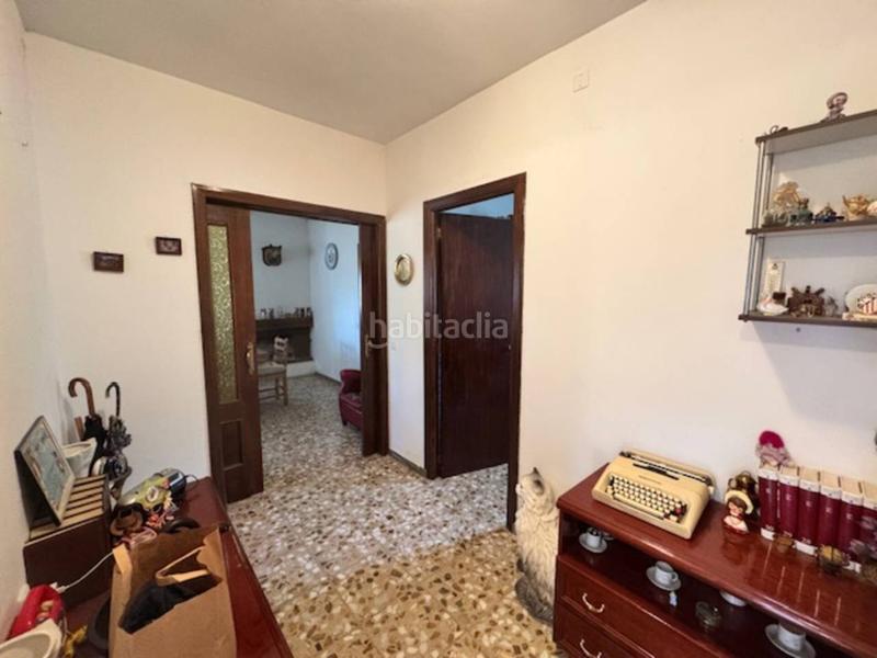 Foto f054fa12-578f-41cf-b70e-9dcce470dbe9. Casa  unifamiliar con garaje y jardín en Villavieja del Lozoya