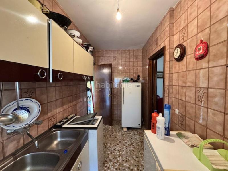 Foto fc0b6f7f-e7ab-4e8f-abc1-f922c8a99b77. Casa  unifamiliar con garaje y jardín en Villavieja del Lozoya