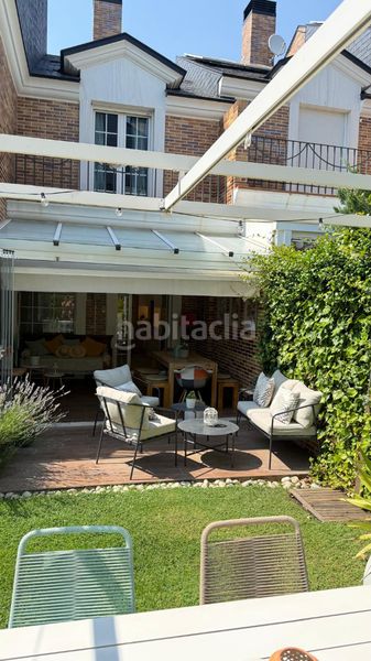 Foto ff494842-da29-4e89-8a3c-04b43ade7ab5. Casa adossada amb xemeneia calefacció piscina a El Pastel Boadilla del Monte