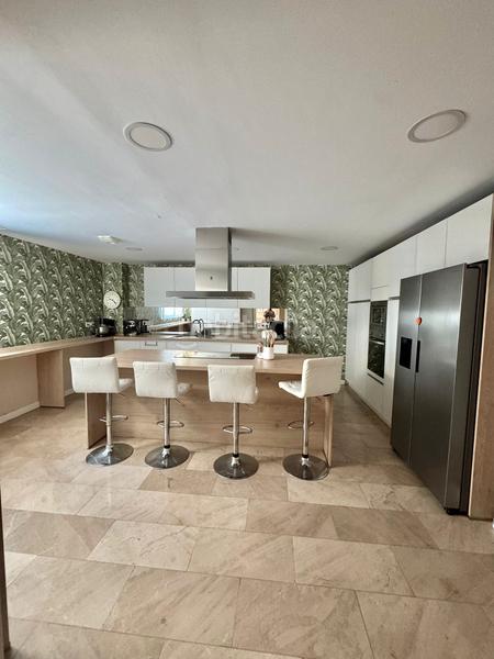 Foto f75c1881-f220-4448-874a-3e8cb07c8552. Casa a schiera con riscaldamento parcheggio piscina in Majadahonda