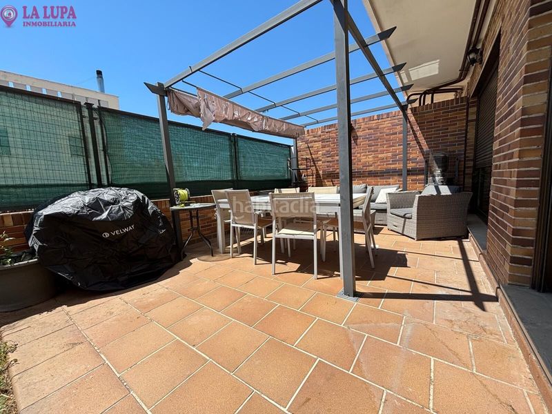 Foto 173aa0e1-41eb-4387-a9fe-10e79e5f1899. Planta baixa amb calefacció aparcament piscina a Colmenar Viejo