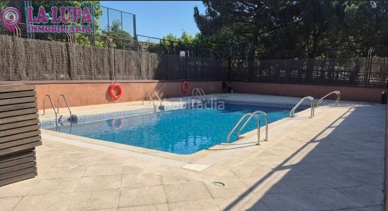 Foto da3f8a2f-fe5c-4b06-85c8-7a32e04e10bb. Planta baixa amb calefacció aparcament piscina a Colmenar Viejo