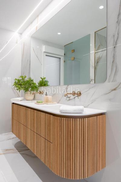 Foto 2bef90dc-49f2-46fb-834f-6e167443f9d4. Piso Recoletos impecable piso exterior con 3 balcones y una impresionante terraza de 119 m con jardín privado, un verdadero oasis urba en Madrid