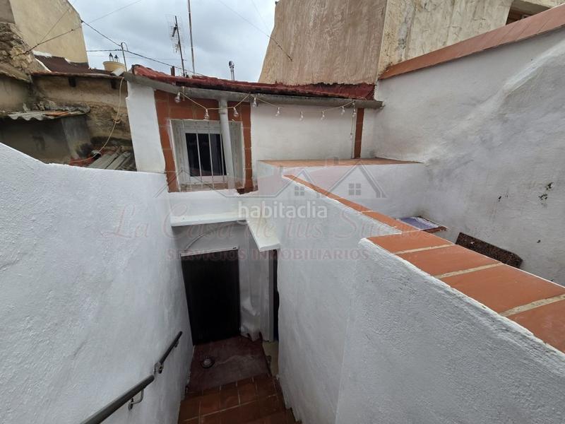 Foto b9d7341f-0378-436a-a581-fc424568e6ce. Casa adossada amb piscina a Sax