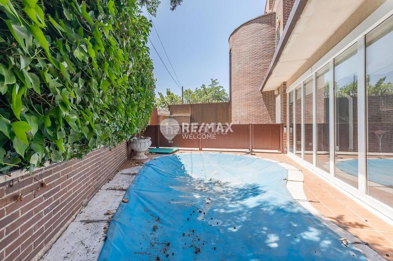 Foto 65bc67fd-748d-4e30-9207-9a107a47b843. Casa pareada chalet exclusivo con jardín, piscina y ascensor privado en arturo soria en Madrid