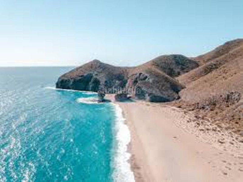 Foto 47a57893-74f4-4387-93f6-59d6a7133a13. Pis amb aparcament piscina a El Toyo Almería