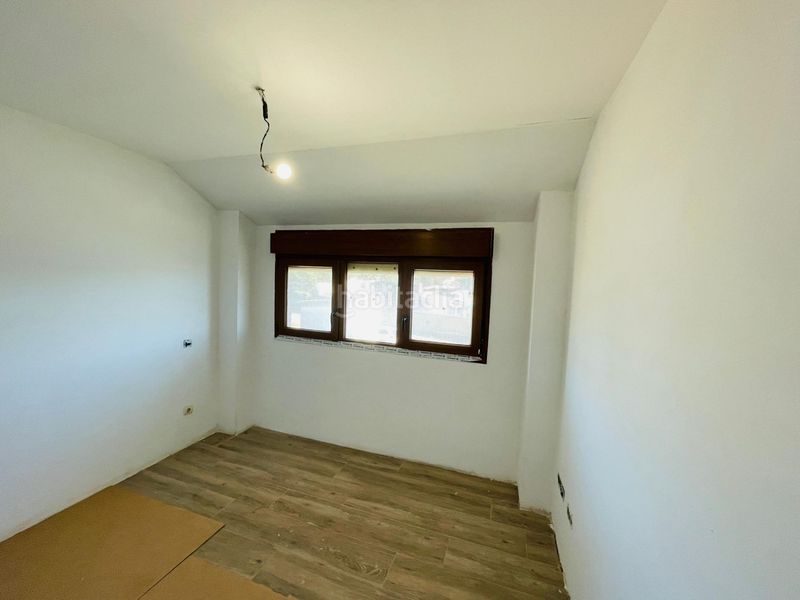 Foto aef72f4e-7e1f-42cd-9388-983ef30d9c07. Casa aparellada amb aparcament a Navalperal de Pinares