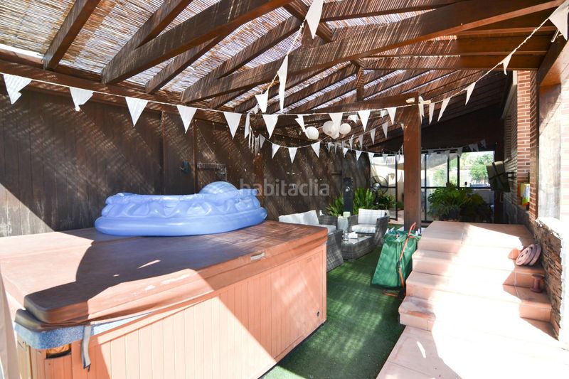 Foto d7a662e1-4a84-4f70-b52d-2a1f7184530c. Casa aparellada amb calefacció aparcament piscina a Griñón