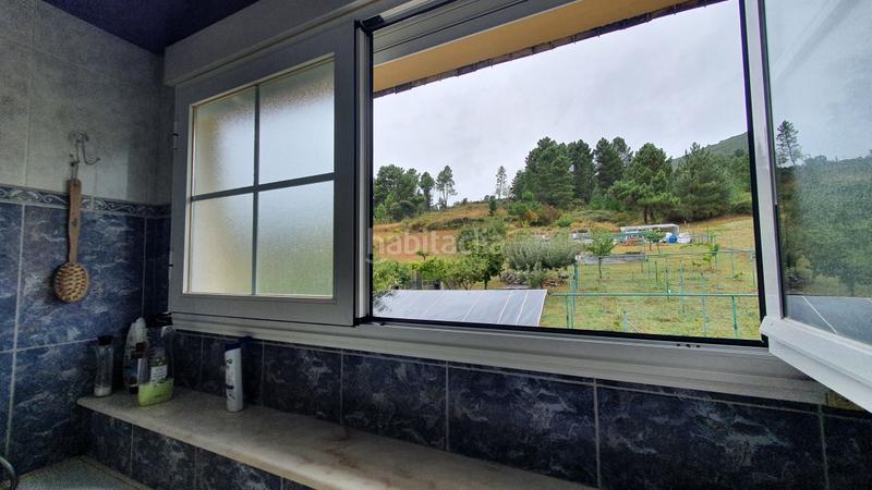 Foto 19c97392-0d76-44b7-9ef2-247e54130a63. Chalet con camino parcheggio in Vega de Espinareda