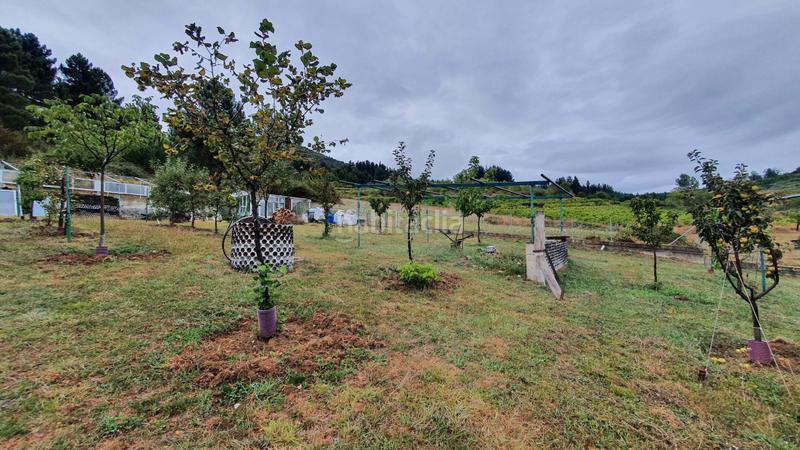 Foto c0857f17-8a3a-4c74-9b58-040dc94bed34. Chalet con camino parcheggio in Vega de Espinareda