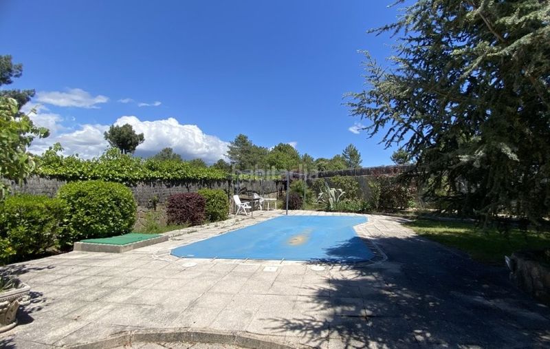 Foto 42ae496e-3fb7-4598-9277-6ef5c546d538. Xalet amb xemeneia calefacció aparcament piscina a Cadalso de los Vidrios