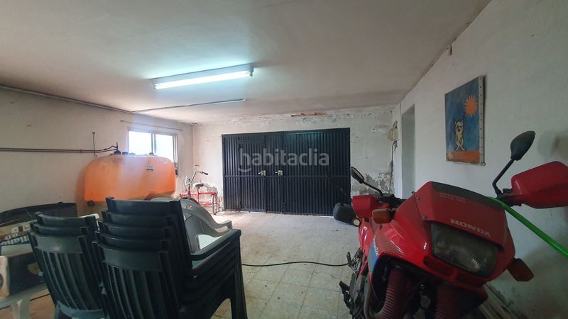 Foto e2f53142-ab62-44c6-9ba5-72bc75f79132. Xalet amb xemeneia calefacció aparcament piscina a Valdemorillo