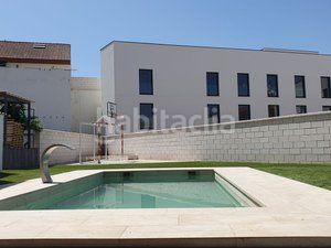 Foto 07759886-5897-4f83-83ed-f42afbabda46. Casa adossada amb xemeneia calefacció aparcament piscina a Villanueva de la Cañada