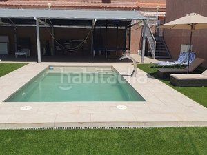 Foto 9781d5f8-06a1-425d-8255-b6560f400d84. Casa adossada amb xemeneia calefacció aparcament piscina a Villanueva de la Cañada