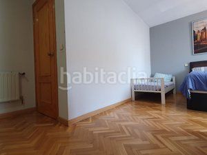 Foto a048ed44-5538-4e45-a00c-eac575c0feee. Casa adossada amb xemeneia calefacció aparcament piscina a Villanueva de la Cañada