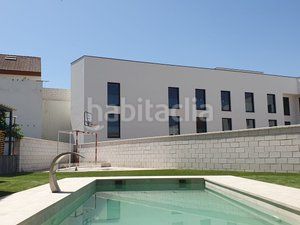 Foto c7c4f3be-c71d-4376-a83f-e0639eebae5f. Casa adossada amb xemeneia calefacció aparcament piscina a Villanueva de la Cañada