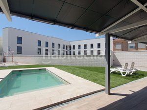 Foto d5251c68-6bd2-44f7-b85b-810b2c41a0da. Casa adossada amb xemeneia calefacció aparcament piscina a Villanueva de la Cañada