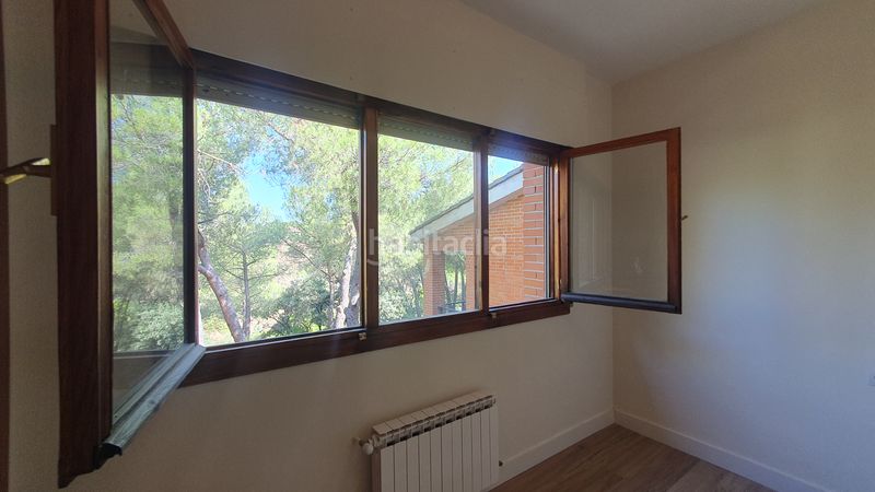 Foto 0413e934-8a10-4d3b-959e-5a6976d47a8b. Rent chalet with fireplace heating parking pool in Valdemorillo