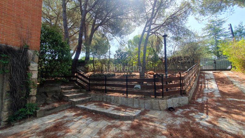 Foto ad9f8658-89a1-4e34-8d9a-082bf8704bfc. Rent chalet with fireplace heating parking pool in Valdemorillo