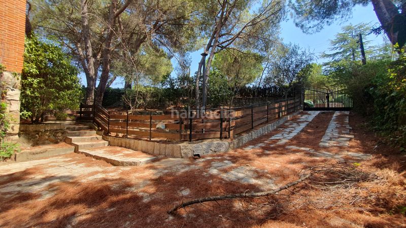 Foto b3f8acda-9951-45d1-a9ea-eadd36306ec2. Rent chalet with fireplace heating parking pool in Valdemorillo