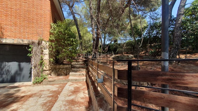 Foto c39ee4d5-7e6a-4f5e-a2e3-f687b2e70578. Rent chalet with fireplace heating parking pool in Valdemorillo