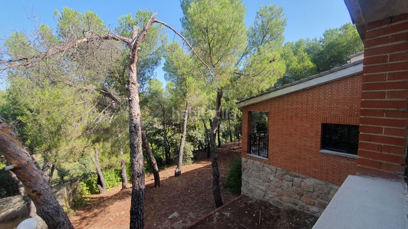 Foto c9bc0cf9-5d47-42c3-9803-aa5064d79af6. Rent chalet with fireplace heating parking pool in Valdemorillo