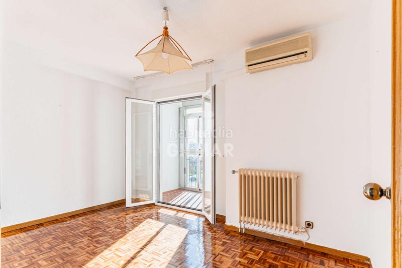 Foto bac97531-acba-40bc-aae7-fbd54314c172. Attico con riscaldamento parcheggio in Moscardó Madrid