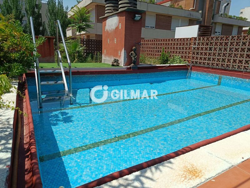 Foto 8e8d6404-11ec-4356-a54f-6e973611767c. Àtic amb calefacció aparcament piscina a San Pascual Madrid