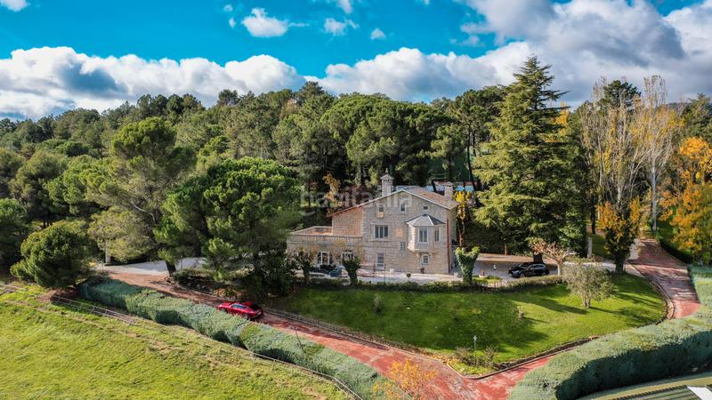 Foto ea92cbac-ea4d-42f6-a819-940ae6b46557. Mas avec chauffage parking piscine dans Guadarrama