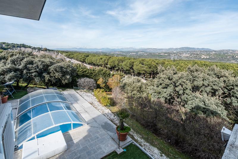 Foto 51d44ef7-b443-4668-a938-8e60951660c1. Chalet mit kamin heizung parking pool in puerto Galapagar-las cuestas Galapagar