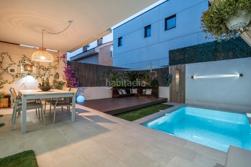 Foto 863f909f-6abf-4be8-a88d-3bf927549d3f. Casa adossada amb xemeneia calefacció aparcament piscina a Madrid