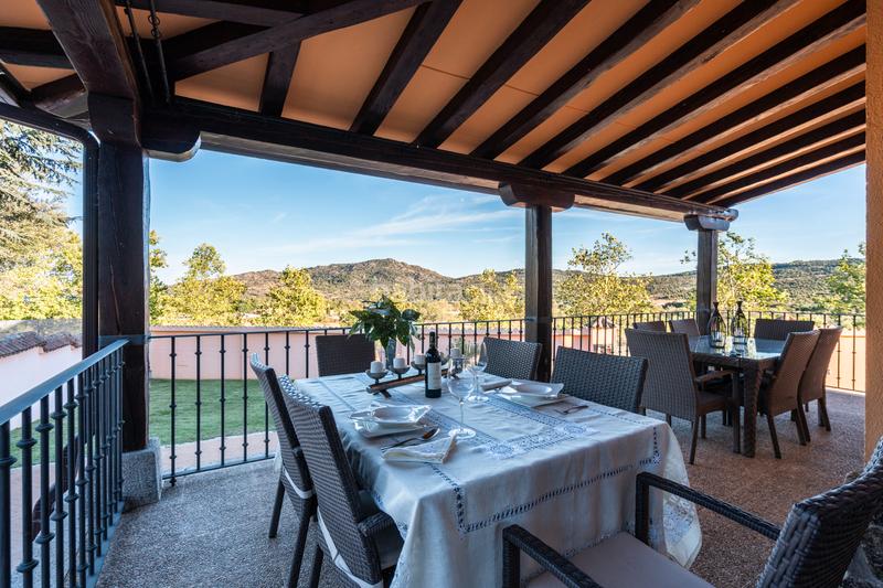 Foto 150da438-ff6a-443a-96ca-0ba2893150c9. Xalet amb xemeneia calefacció piscina a Manzanares el Real