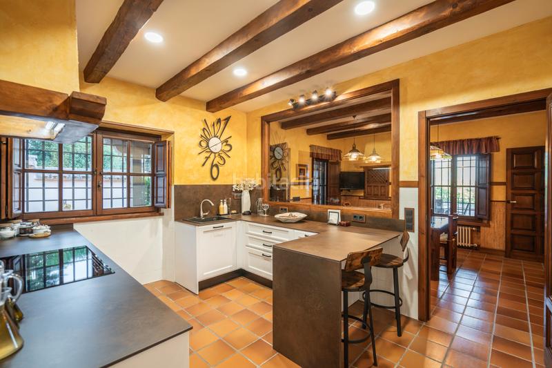 Foto 231c42d5-a956-4559-8999-9864a9c07c82. Xalet amb xemeneia calefacció piscina a Manzanares el Real