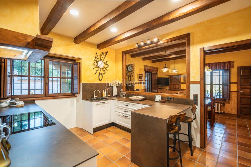 Foto 2b7a86e5-bffb-49a7-b471-a869cee4caf5. Xalet amb xemeneia calefacció piscina a Manzanares el Real