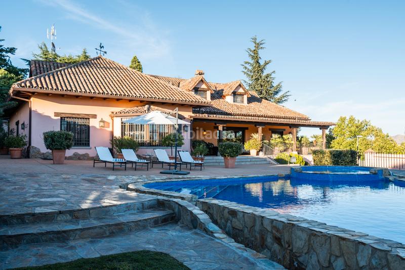 Foto 9eed97fe-1228-42f7-8c0a-47ce894cb181. Xalet amb xemeneia calefacció piscina a Manzanares el Real