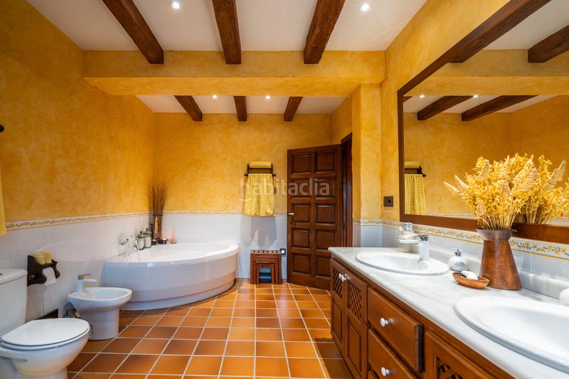 Foto ad49f885-ee15-4cfb-af12-2a932f0ff88c. Xalet amb xemeneia calefacció piscina a Manzanares el Real