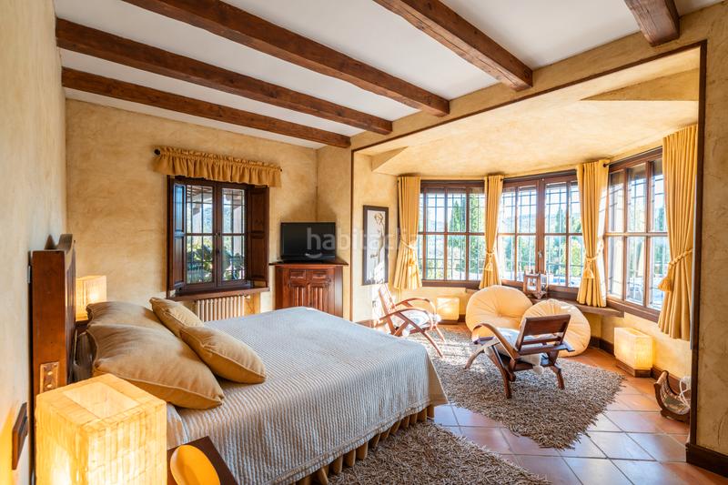 Foto db83f4d8-a4ff-4afa-8c40-230c8a8e2209. Xalet amb xemeneia calefacció piscina a Manzanares el Real