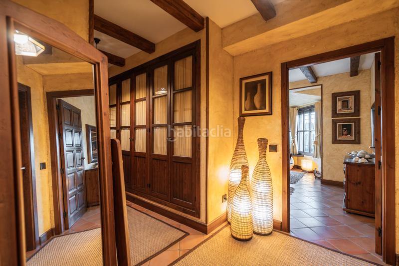 Foto dc418a44-6a9a-45c7-ad75-ebcb34b2bcee. Xalet amb xemeneia calefacció piscina a Manzanares el Real